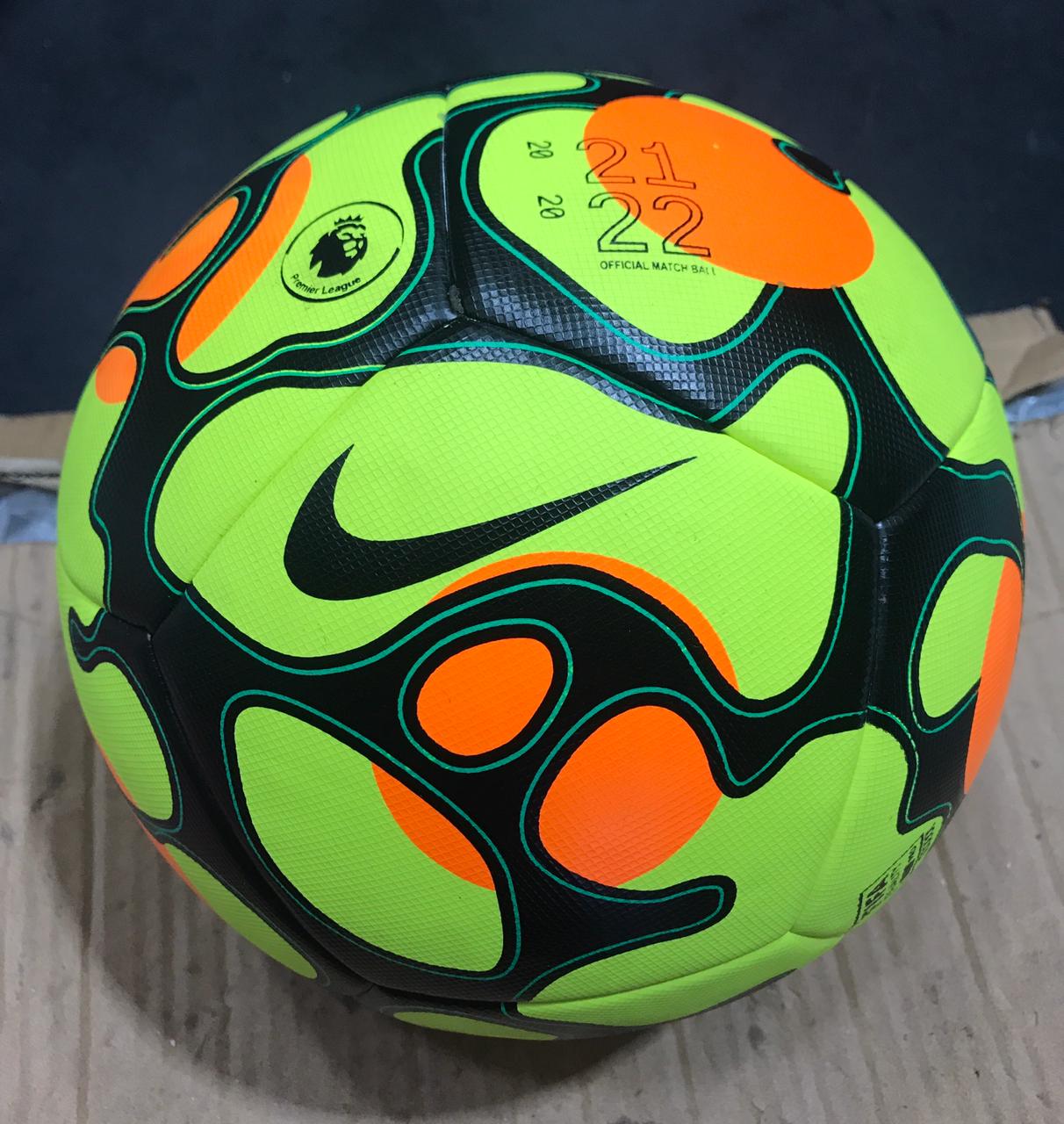 Green and Orange Nike Soccer Ball