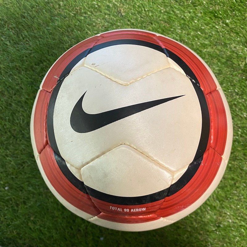 Red and White Nike Soccer Ball