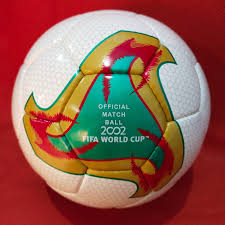 White and Yellow Adidas Fevernova 2002 World Cup Soccer Ball